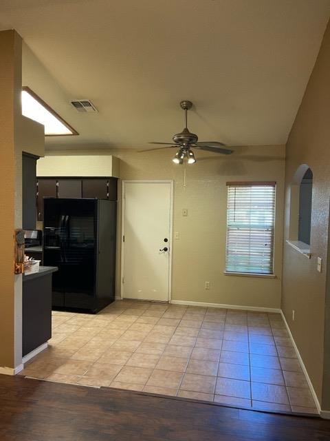 1240 Seneca Drive Madera, CA 93637 - Photo 5 of 21 a view of an empty room with a kitchen