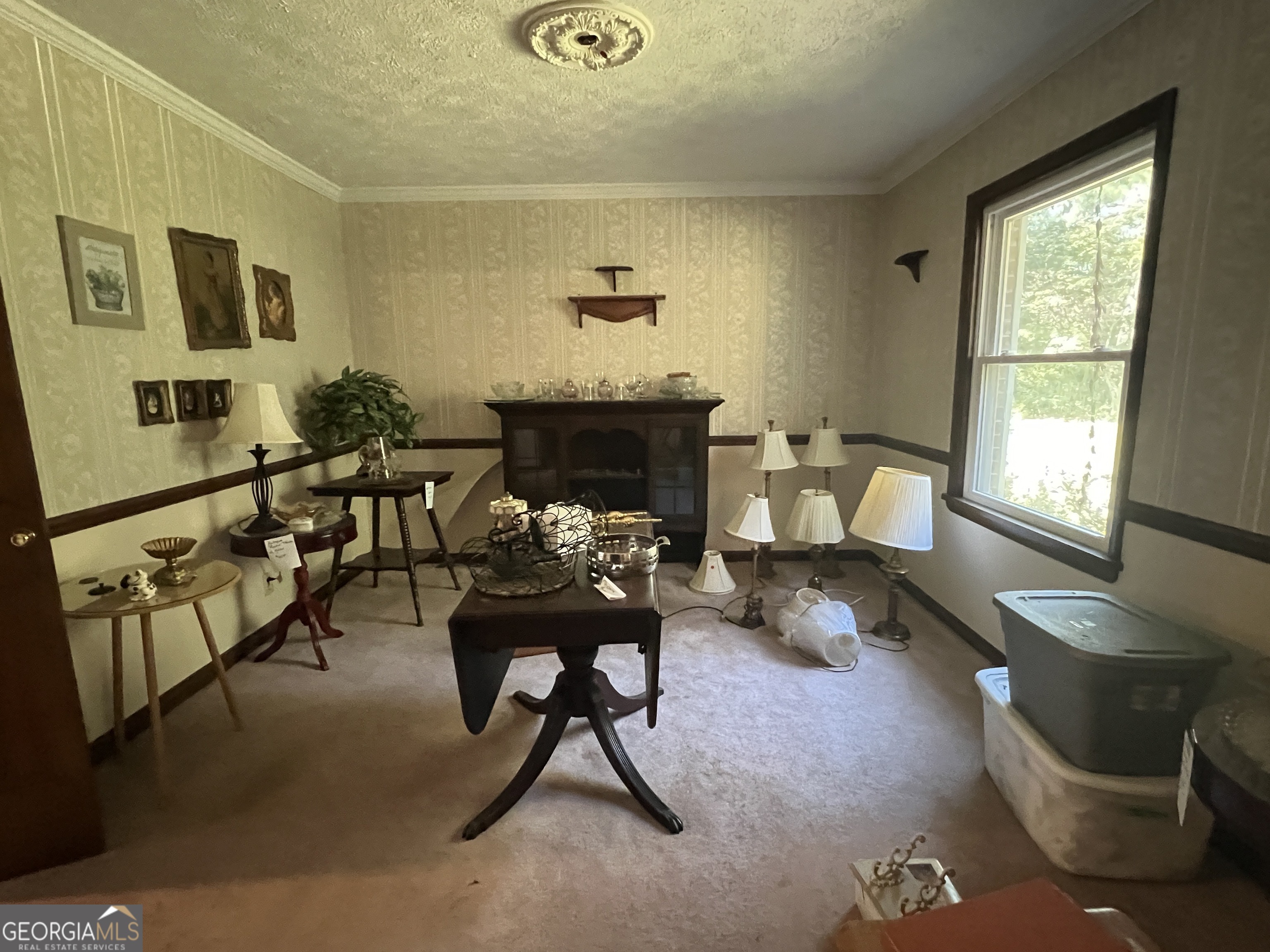 1500 Pine Forest Road Mansfield, GA 30055 - Photo 34 of 47 a living room with furniture and a window