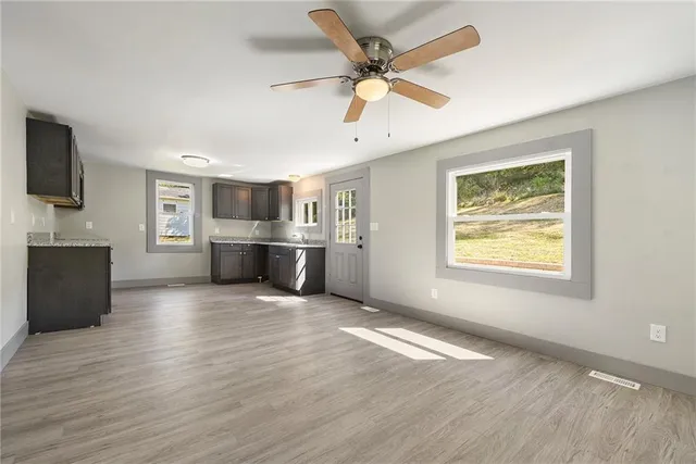 a view of kitchen and windows