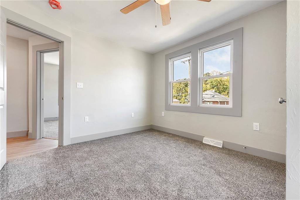 808 Mill Street Bridgeville, PA 15017 - Photo 21 of 27 a view of an empty room with a window