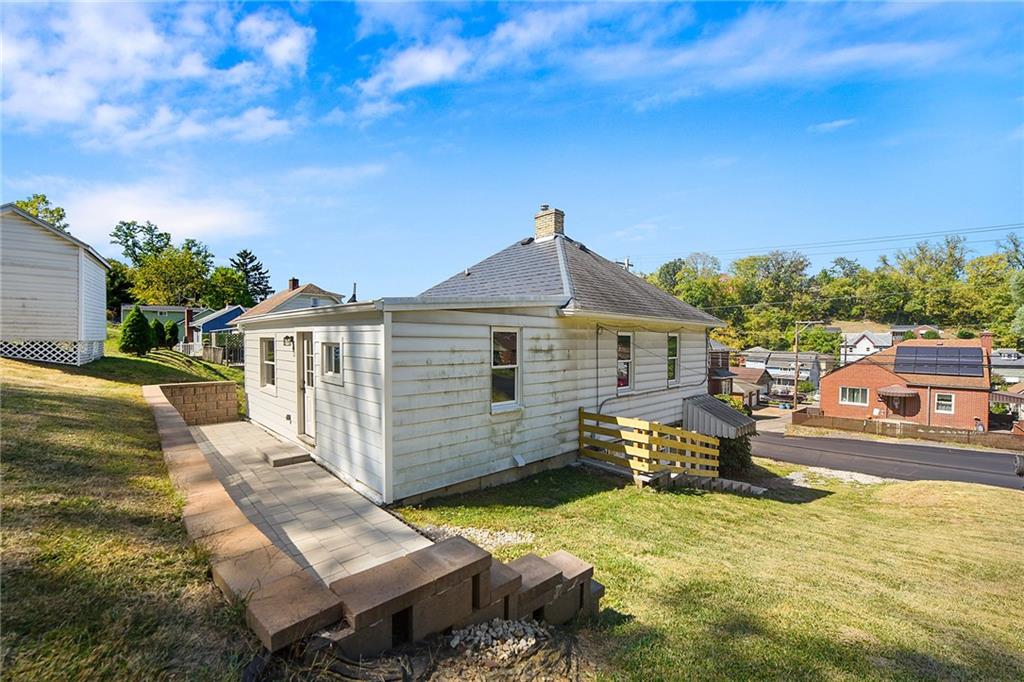 808 Mill Street Bridgeville, PA 15017 - Photo 4 of 27 a front view of a house with a yard