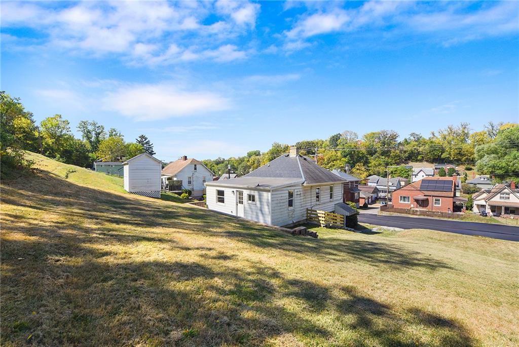 808 Mill Street Bridgeville, PA 15017 - Photo 5 of 27 a view of a house with a big yard
