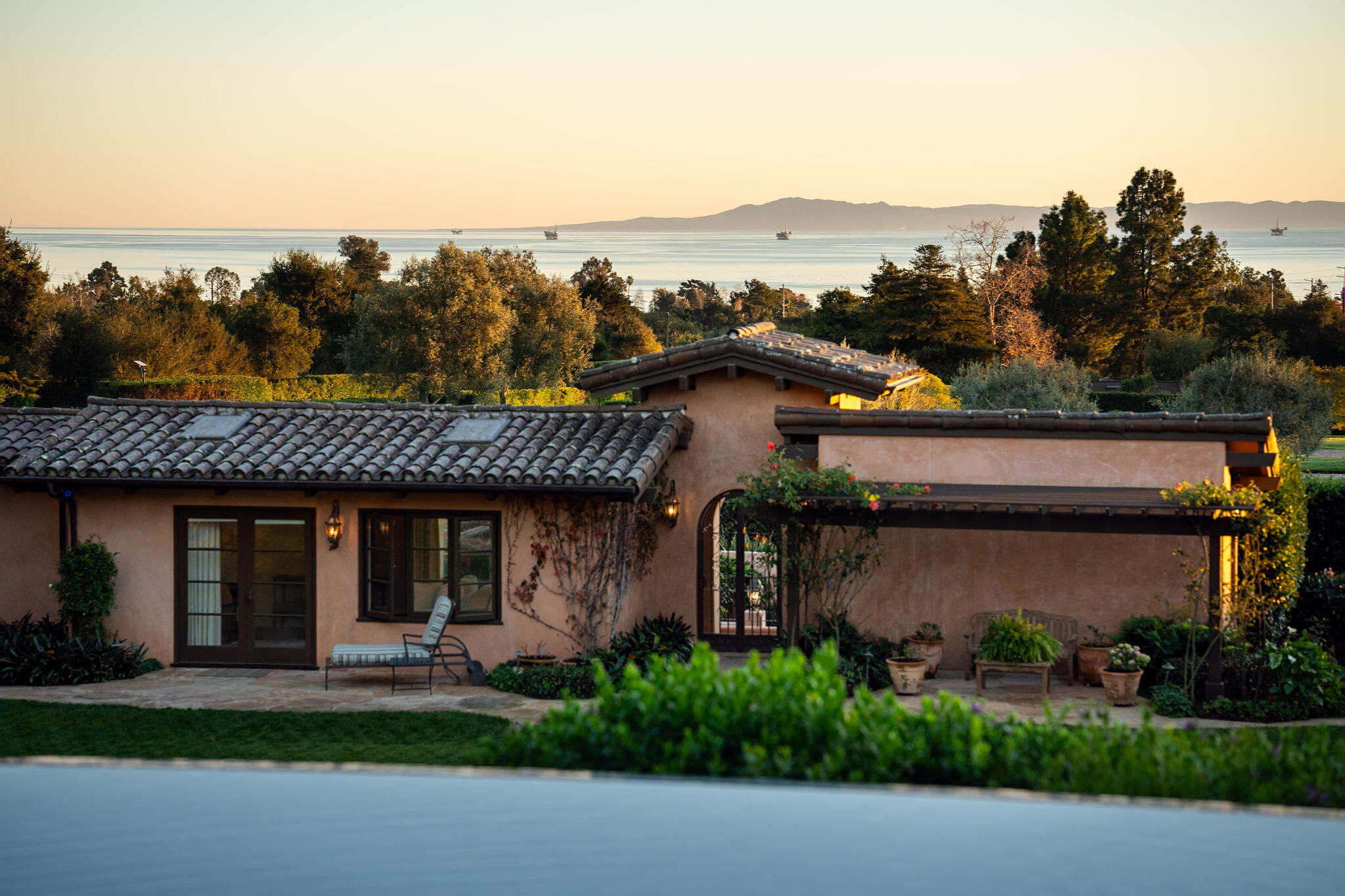 420 Santa Rosa Lane Santa Barbara, CA 93108 - Photo 24 of 29 a front view of a house with a garden and lake view