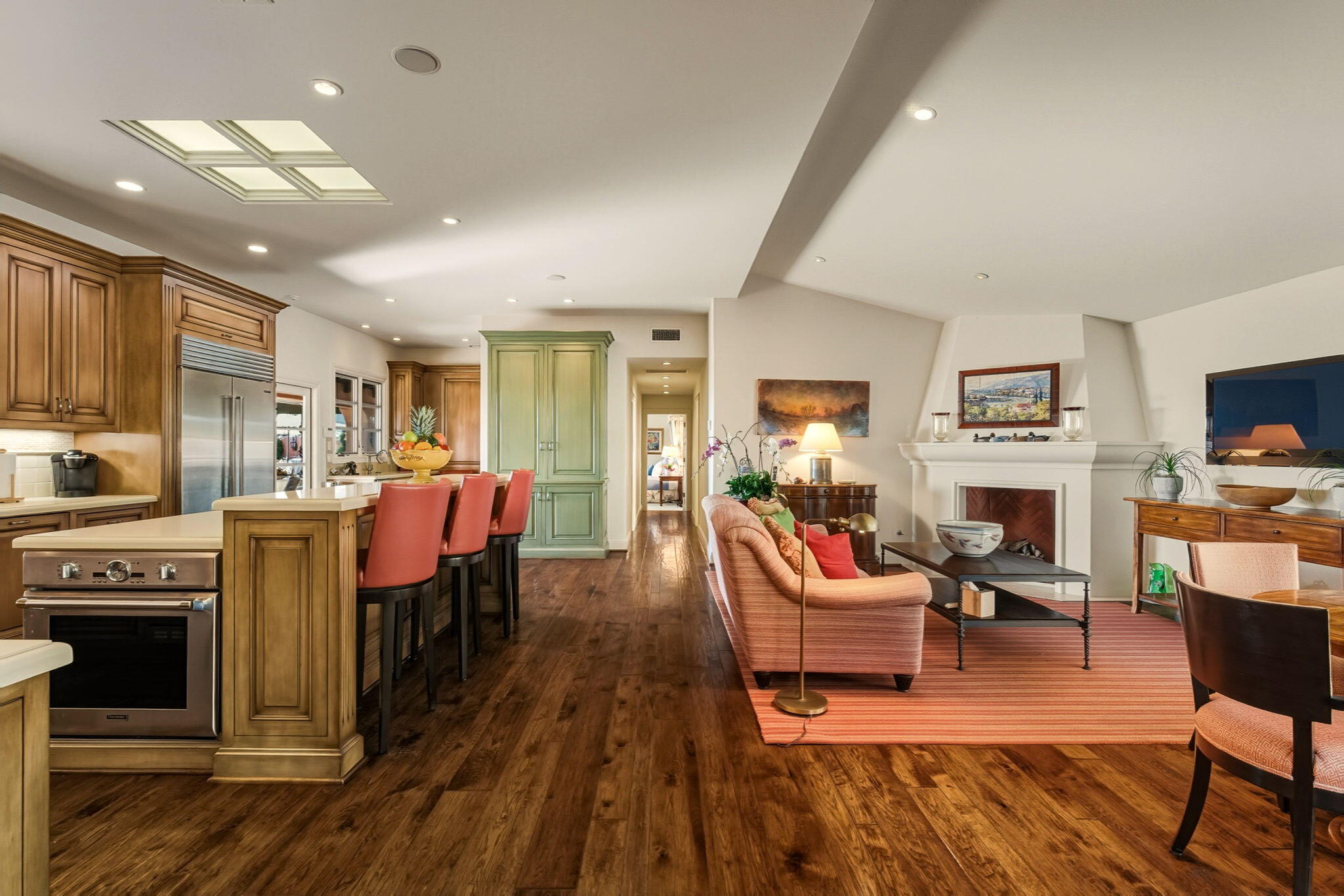 420 Santa Rosa Lane Santa Barbara, CA 93108 - Photo 10 of 29 a living room with furniture a fireplace and a flat screen tv