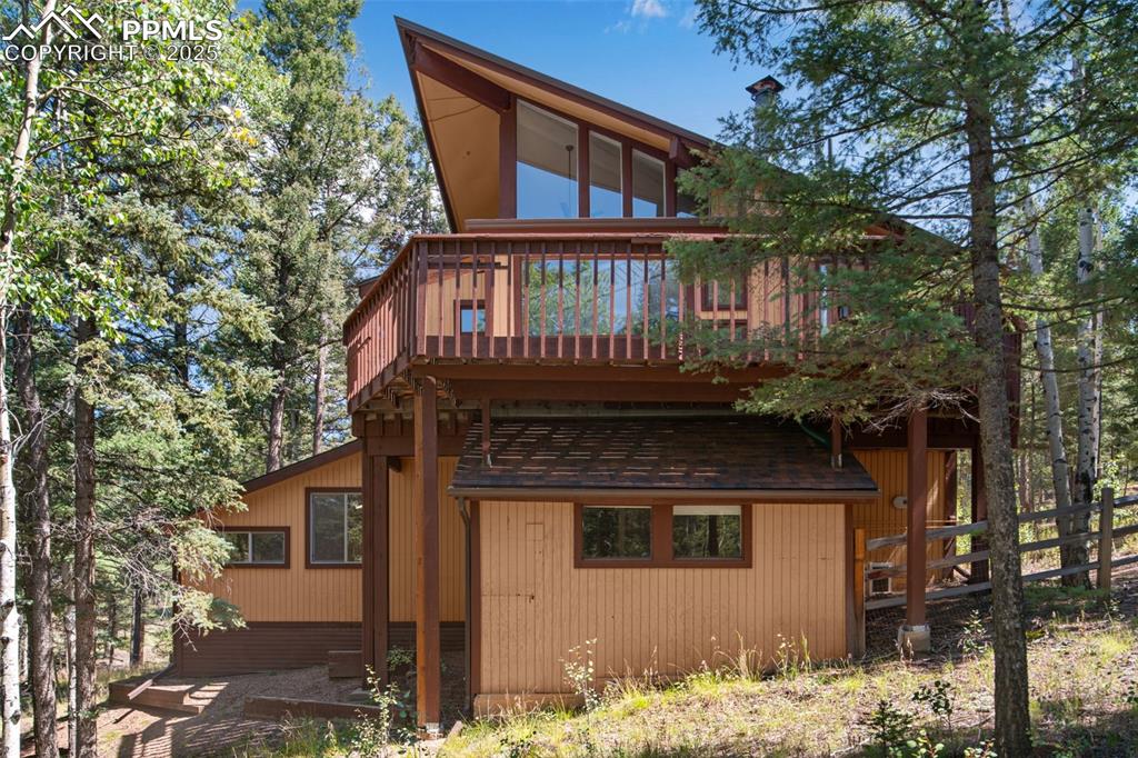 57 Granite Road Florissant, CO 80816 - Photo 36 of 46 a front view of a house with a yard