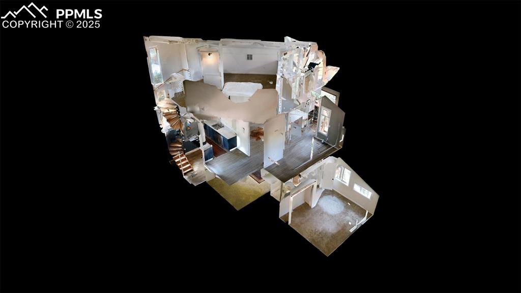 57 Granite Road Florissant, CO 80816 - Photo 46 of 46 a bed sitting next to a white wall