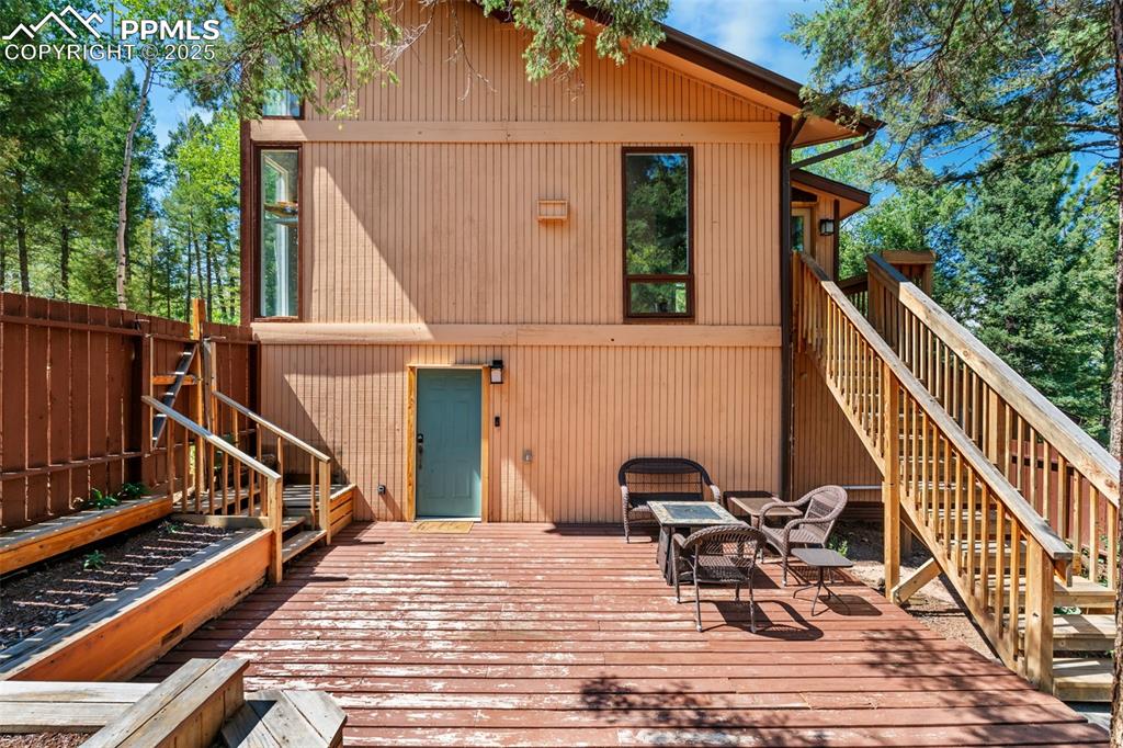 57 Granite Road Florissant, CO 80816 - Photo 7 of 46 a view of deck with chairs and wooden fence