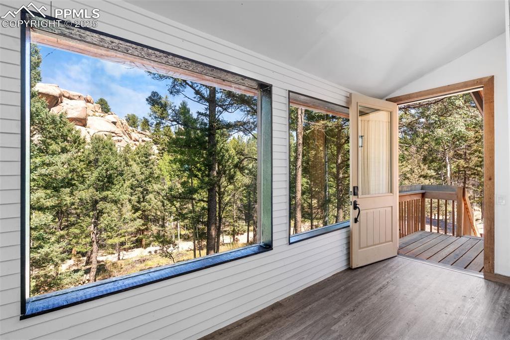 57 Granite Road Florissant, CO 80816 - Photo 8 of 46 a view of a large window with wooden floor