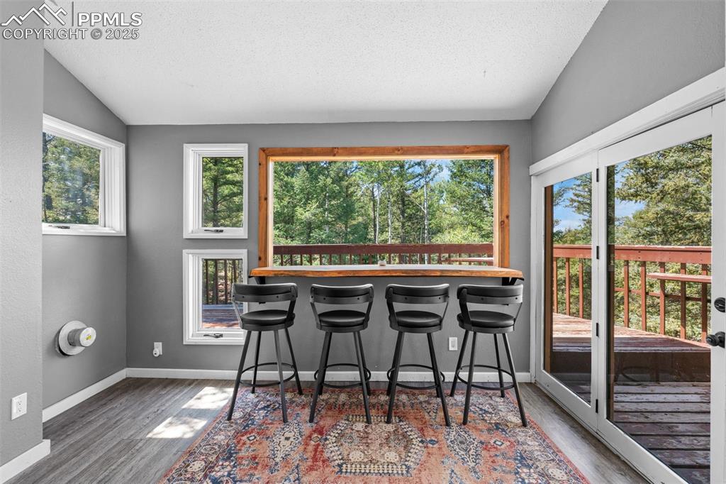 57 Granite Road Florissant, CO 80816 - Photo 10 of 46 a dining room with furniture and window