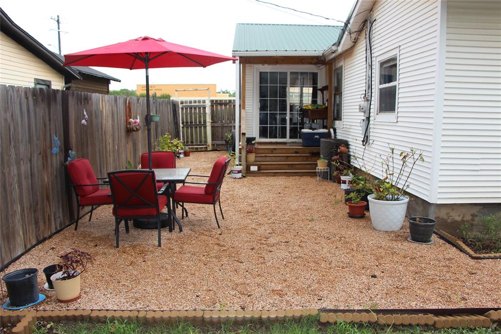 800 Griffin Road Albany, TX 76430 - Photo 14 of 15 a view of a two chairs in the patio