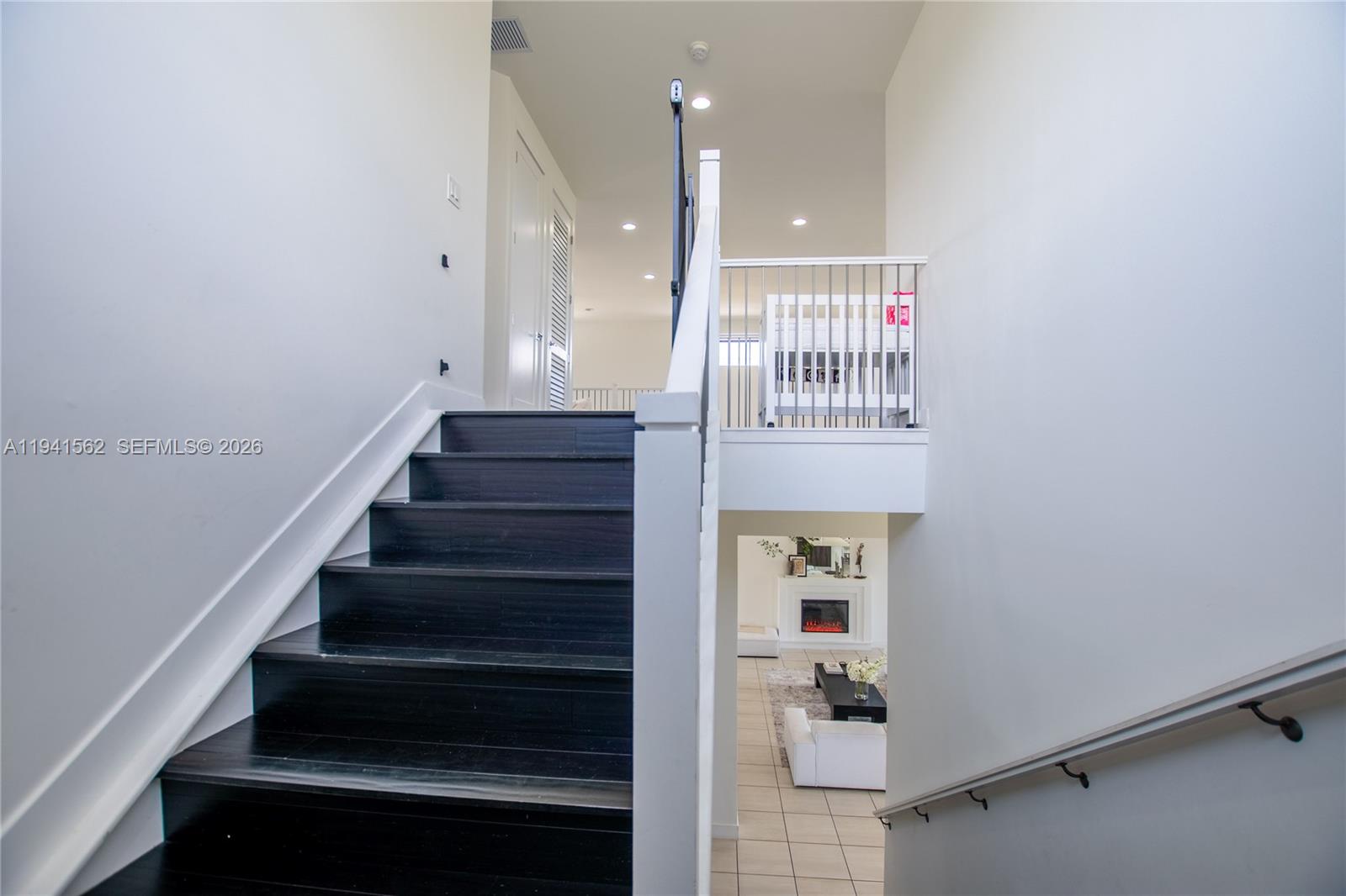 15821 Southwest 49th Street Southwest Ranches, FL 33331 - Photo 22 of 67 a view of entryway and hall with wooden floor