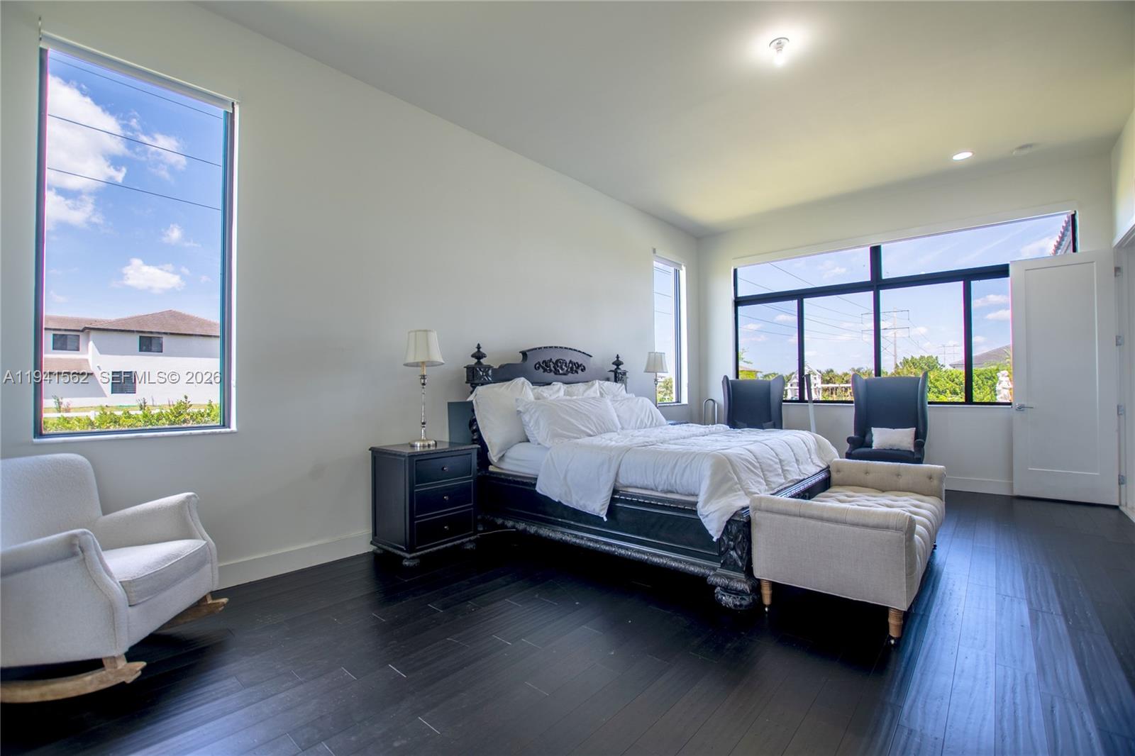 15821 Southwest 49th Street Southwest Ranches, FL 33331 - Photo 27 of 67 a bedroom with a bed and a couch