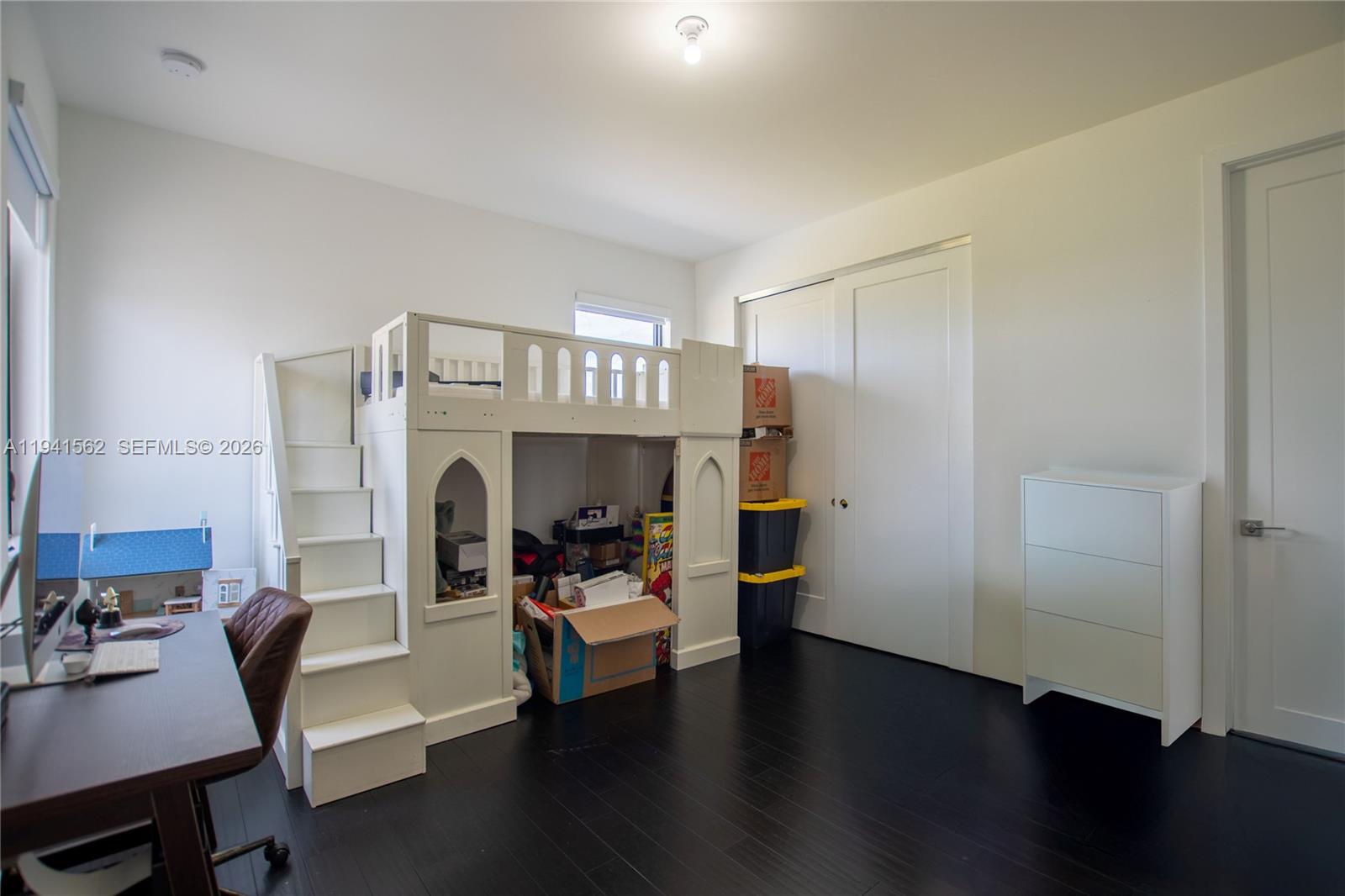 15821 Southwest 49th Street Southwest Ranches, FL 33331 - Photo 45 of 67 a living room with furniture and a fireplace
