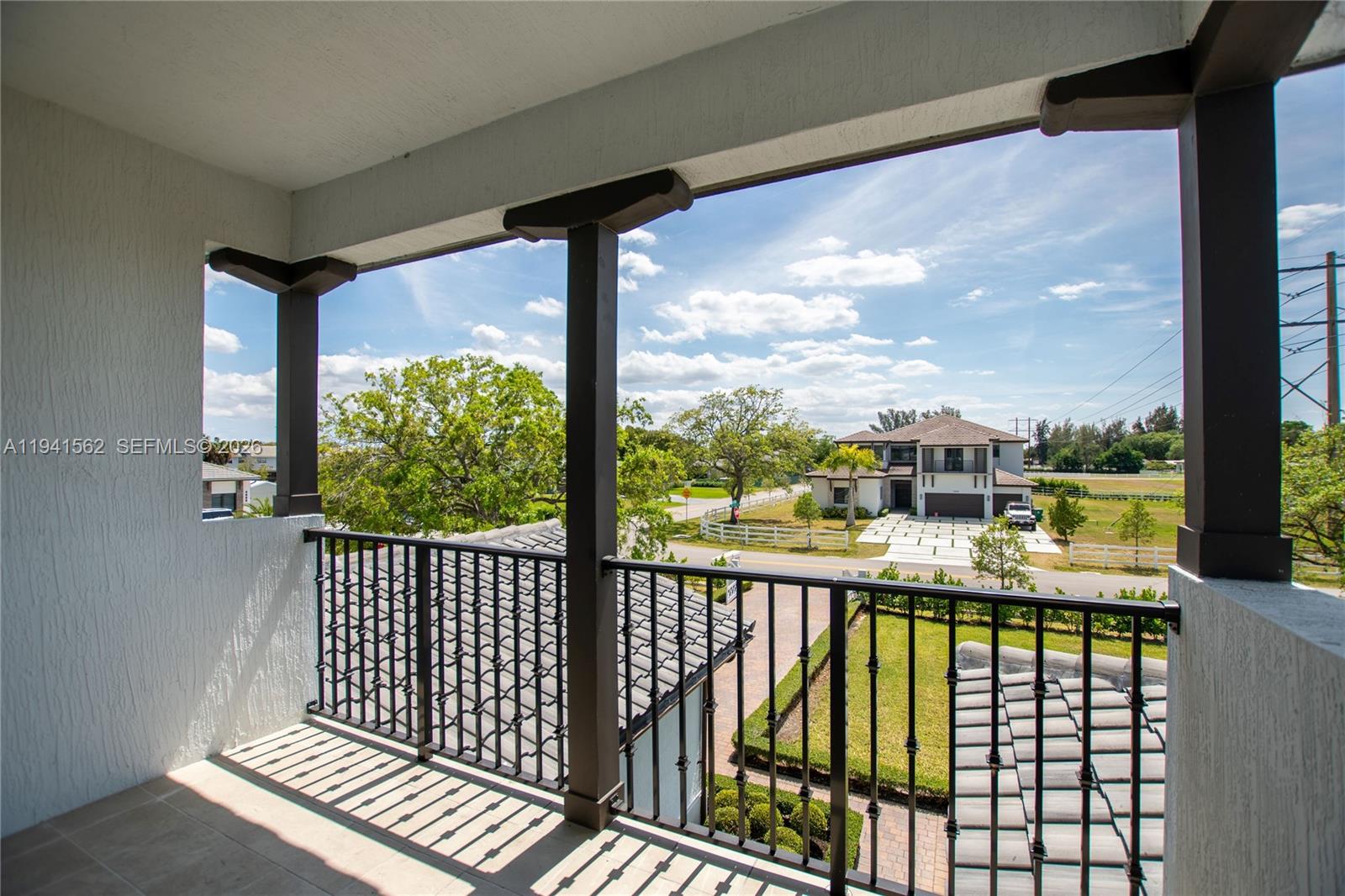 15821 Southwest 49th Street Southwest Ranches, FL 33331 - Photo 51 of 67 a view of a city from a balcony