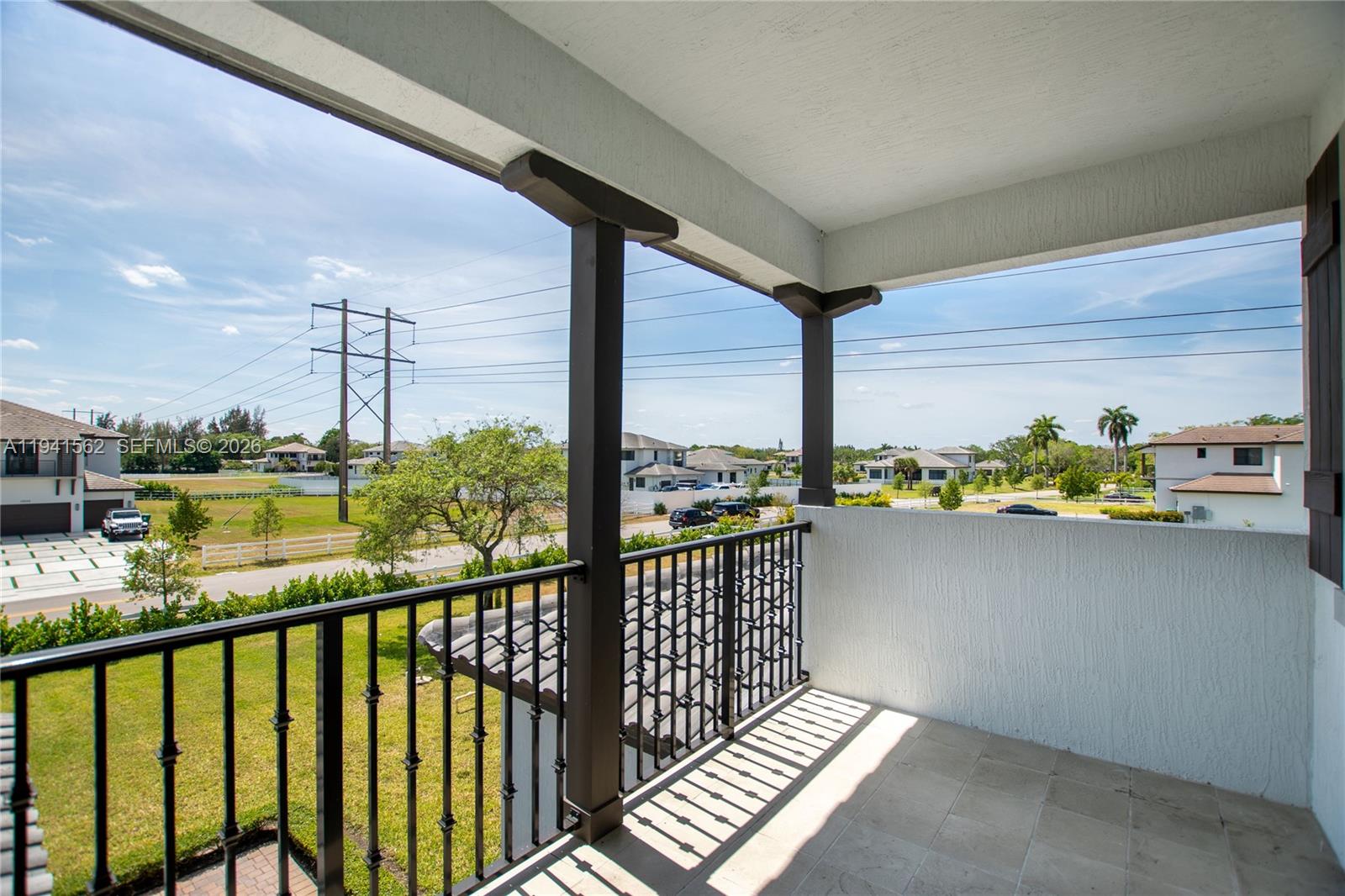 15821 Southwest 49th Street Southwest Ranches, FL 33331 - Photo 52 of 67 a view of city from a balcony