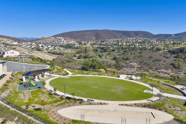 a view of a swimming pool with a lake view