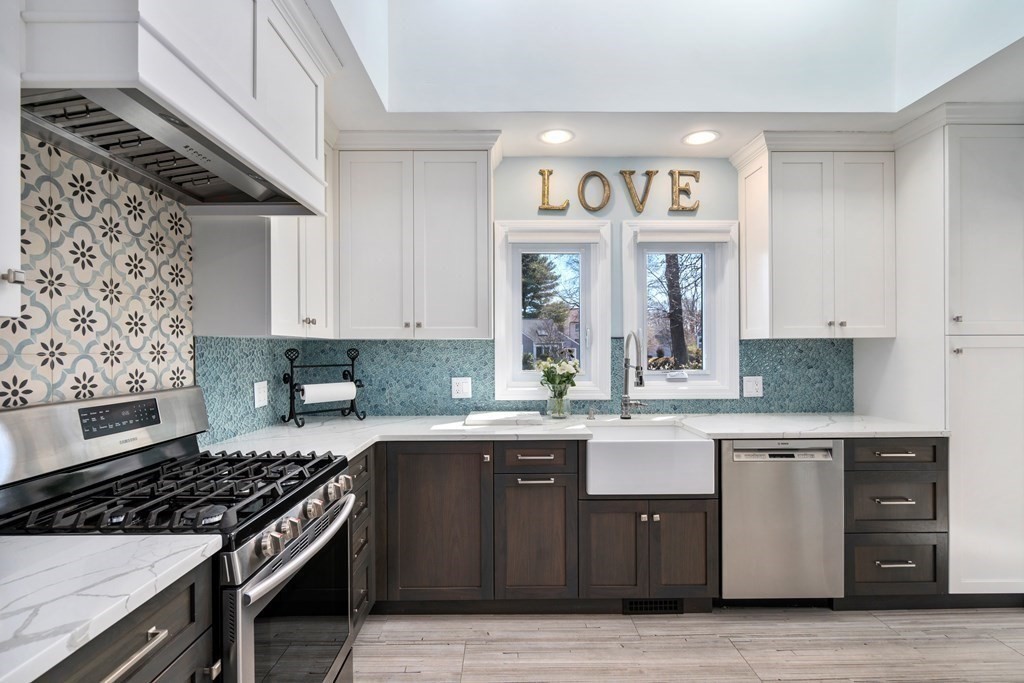 a kitchen with a stove and a sink