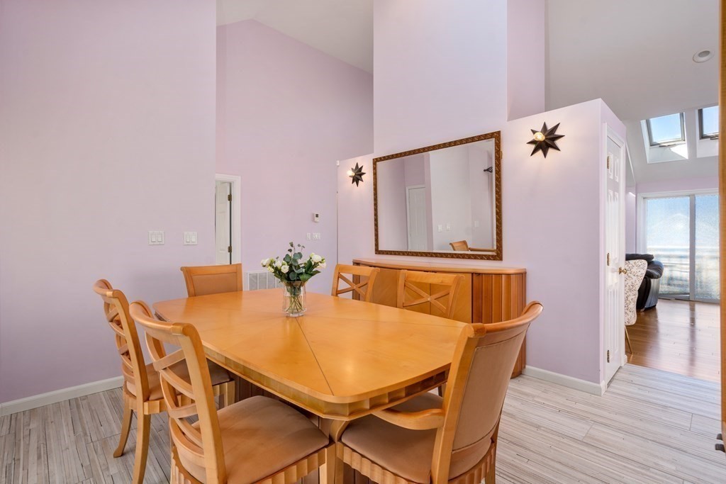 5 Mulberry Lane Canton, MA 02021 - Photo 12 of 36 a view of a dining room with furniture and wooden floor