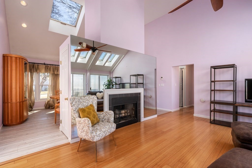 5 Mulberry Lane Canton, MA 02021 - Photo 13 of 36 a living room with furniture and a fireplace