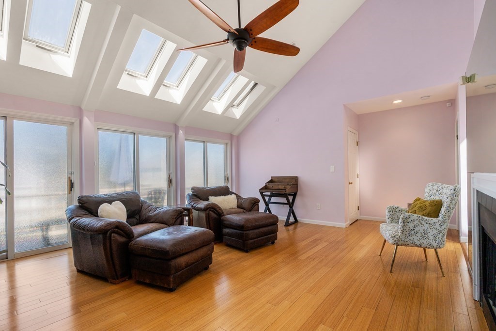 5 Mulberry Lane Canton, MA 02021 - Photo 14 of 36 a living room with furniture and wooden floor