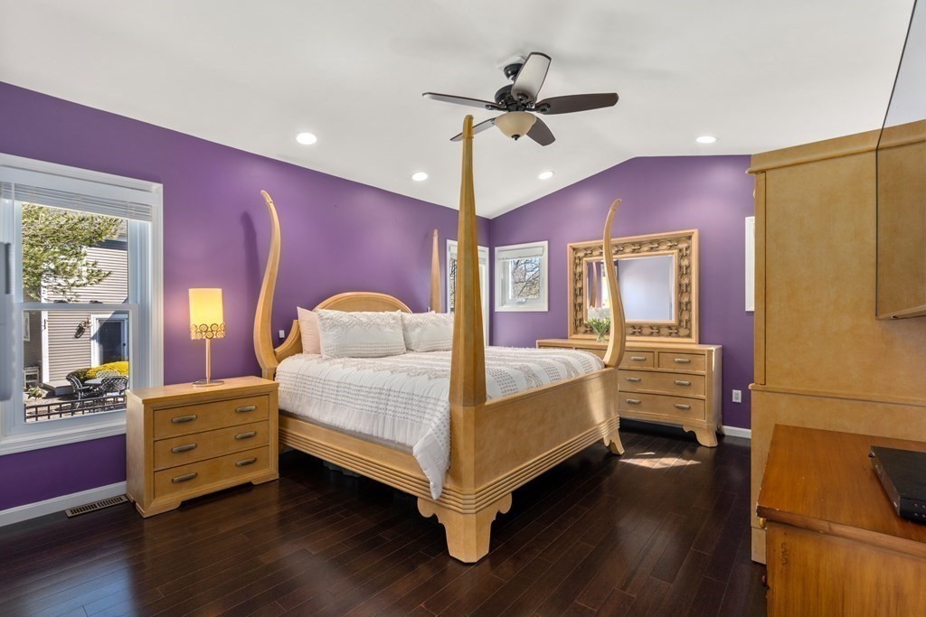 5 Mulberry Lane Canton, MA 02021 - Photo 15 of 36 a bedroom with a bed and a chandelier