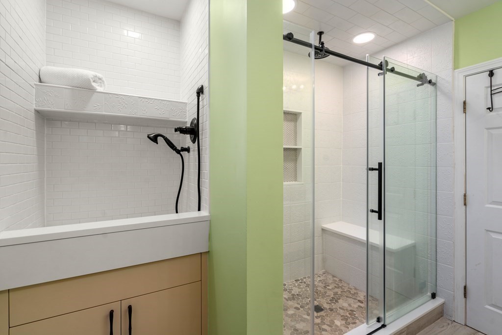 5 Mulberry Lane Canton, MA 02021 - Photo 19 of 36 a bathroom with a shower and a glass door