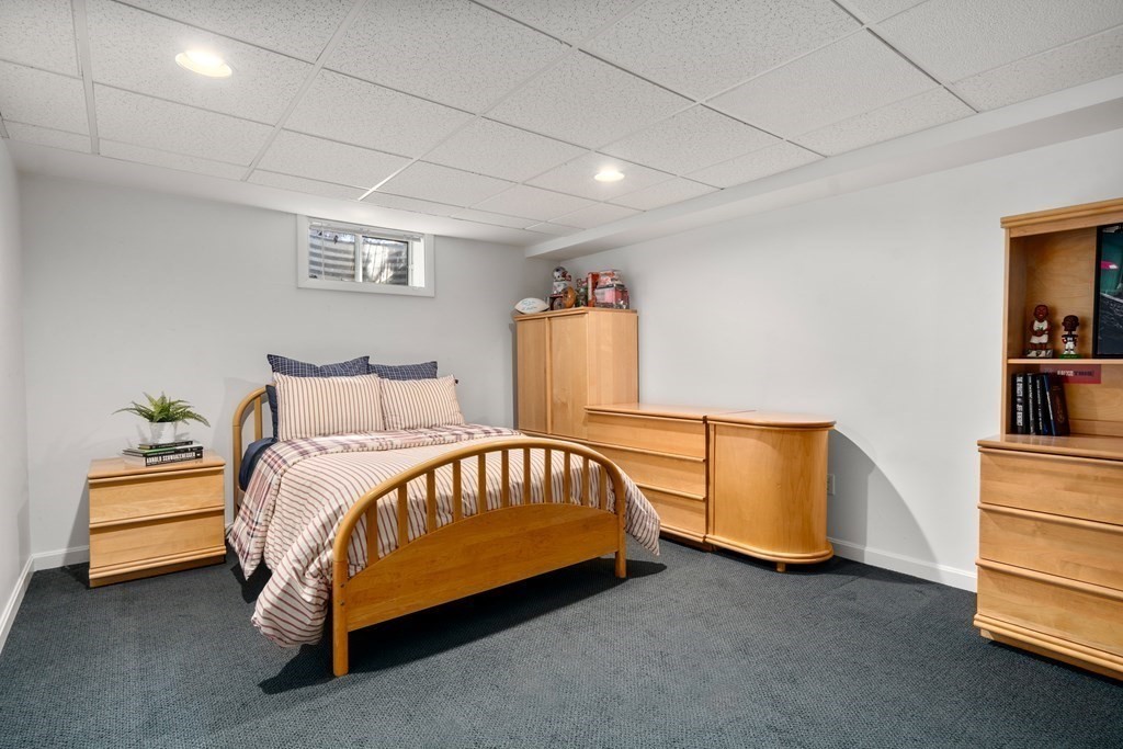 5 Mulberry Lane Canton, MA 02021 - Photo 25 of 36 a bedroom with a bed and a couch
