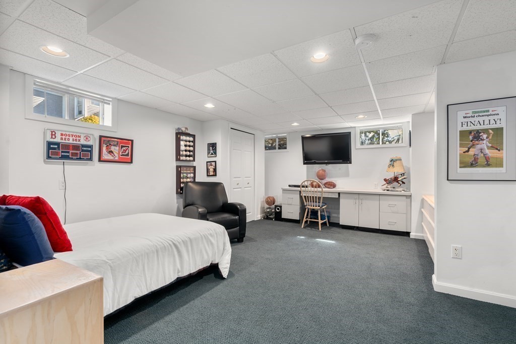 5 Mulberry Lane Canton, MA 02021 - Photo 26 of 36 a bedroom with a bed and a flat screen tv