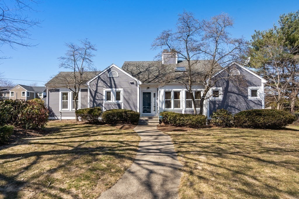 5 Mulberry Lane Canton, MA 02021 - Photo 30 of 36 a front view of a house with a yard