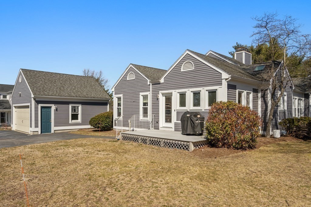 5 Mulberry Lane Canton, MA 02021 - Photo 33 of 36 front view of a house with a yard