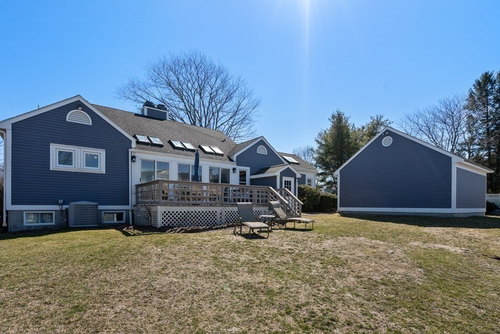 5 Mulberry Lane Canton, MA 02021 - Photo 34 of 36 a front view of a house with a yard