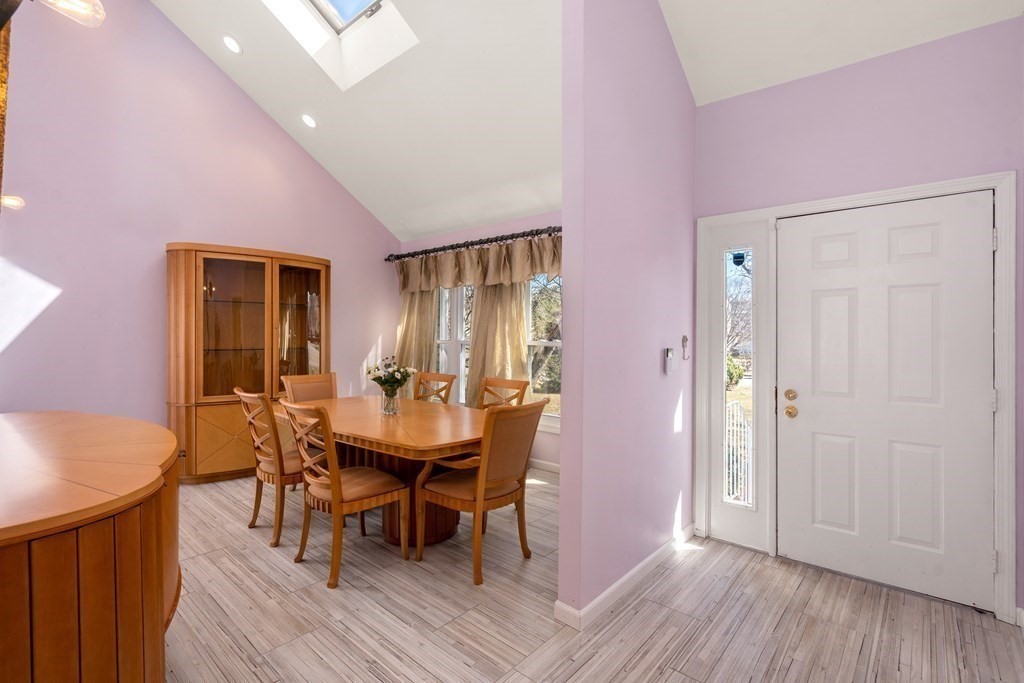 5 Mulberry Lane Canton, MA 02021 - Photo 10 of 36 a view of a dining room with furniture and wooden floor