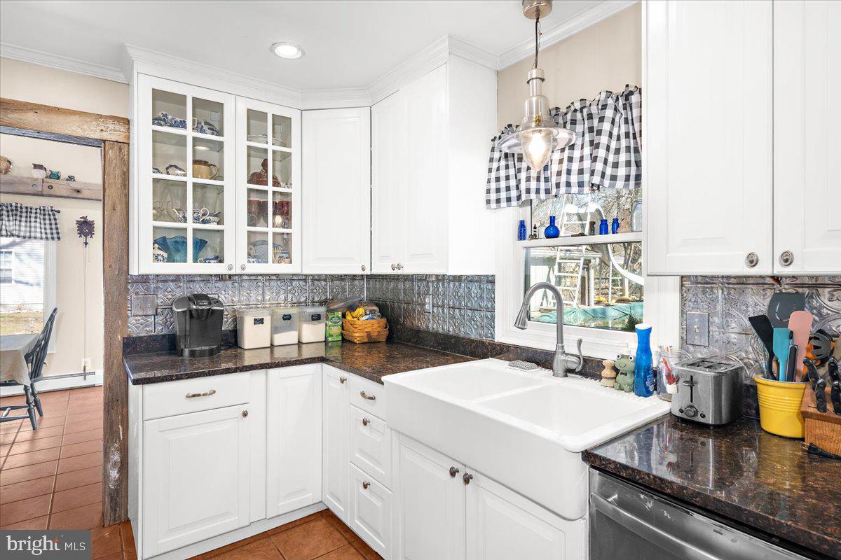 128 Edmore Road Chestertown, MD 21620 - Photo 11 of 59 a kitchen with a sink stove and cabinets