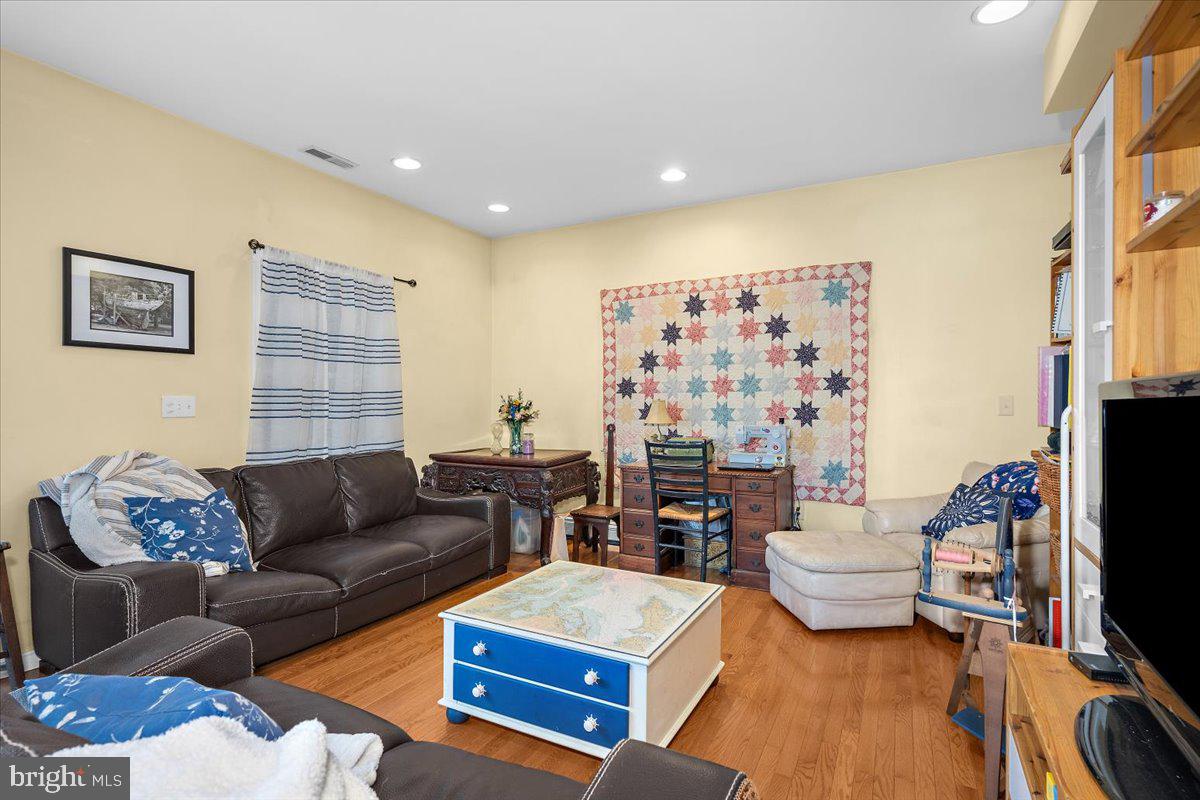 128 Edmore Road Chestertown, MD 21620 - Photo 17 of 59 a living room with furniture and a flat screen tv