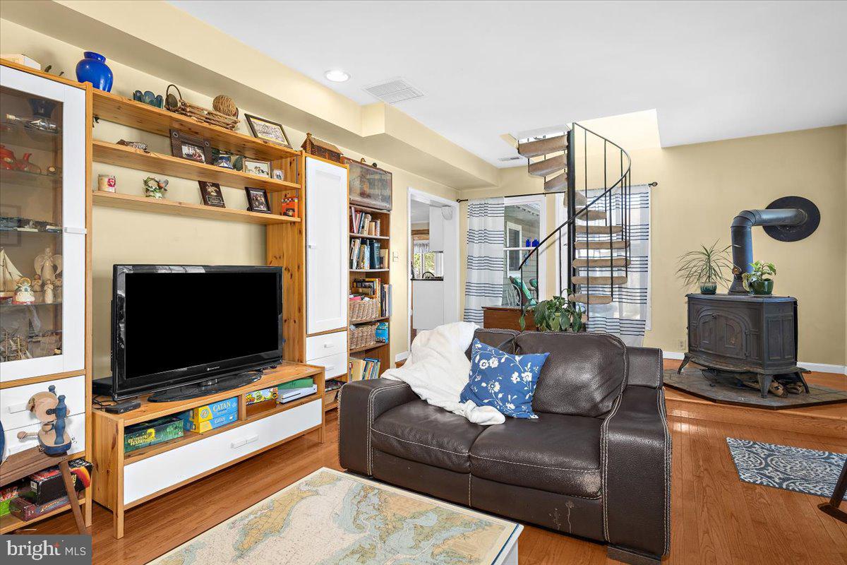 128 Edmore Road Chestertown, MD 21620 - Photo 19 of 59 a living room with furniture and a flat screen tv