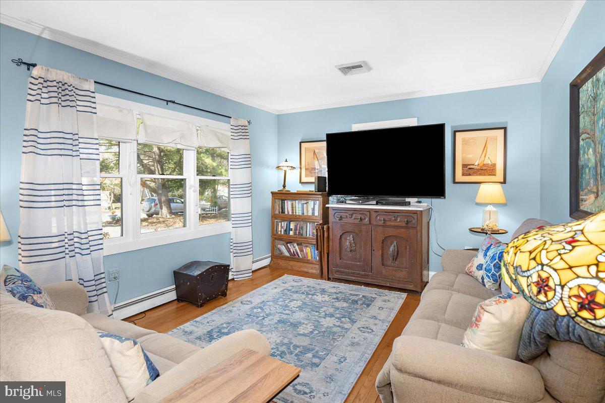 128 Edmore Road Chestertown, MD 21620 - Photo 5 of 59 a living room with furniture and a flat screen tv