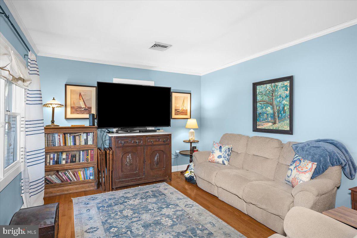 128 Edmore Road Chestertown, MD 21620 - Photo 6 of 59 a living room with furniture and a flat screen tv