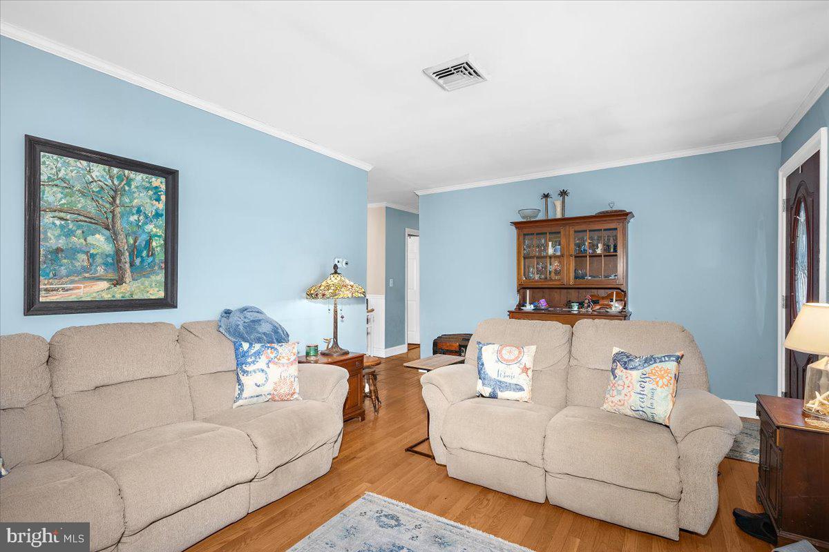 128 Edmore Road Chestertown, MD 21620 - Photo 7 of 59 a living room with furniture and a window