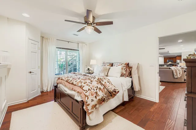 a bedroom with a bed and window