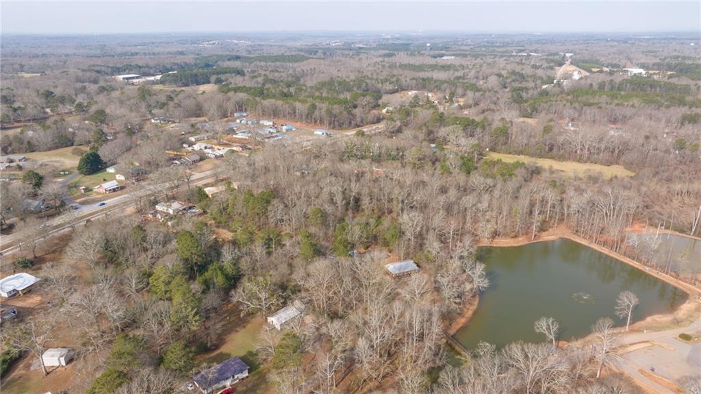 75 Lake Street Jefferson, GA 30549 - Photo 29 of 35 a view of residential houses with outdoor space and trees