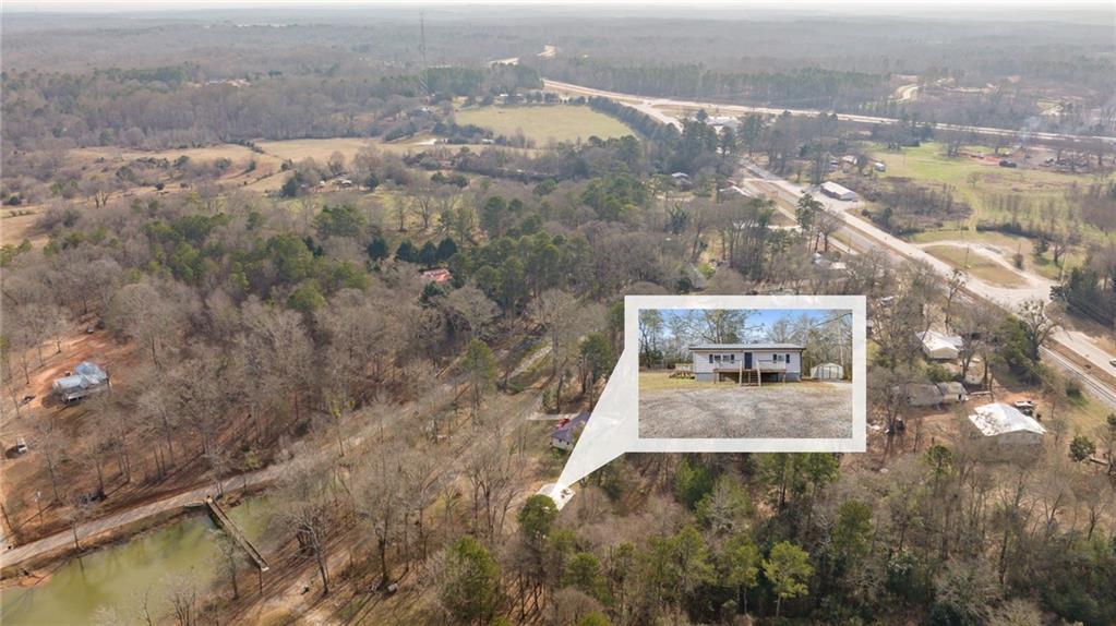 75 Lake Street Jefferson, GA 30549 - Photo 34 of 35 an aerial view of residential houses with outdoor space