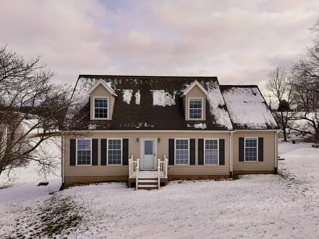 a house with trees in front of it