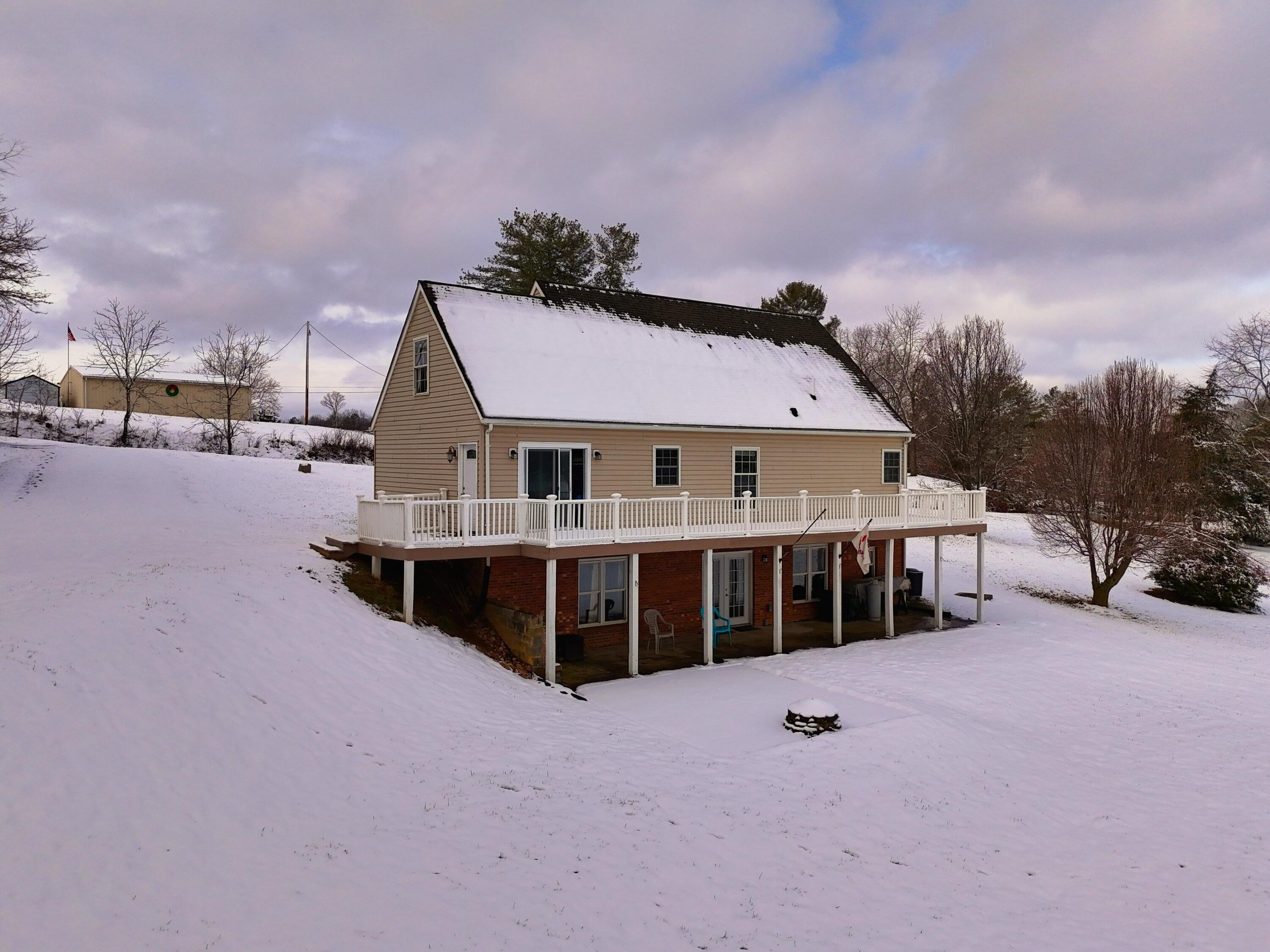 4530 Piney Woods Road Riner, VA 24149 - Photo 58 of 60 a view of a house with a roof deck