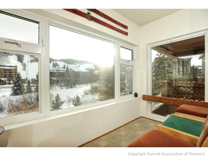 800 Copper Road, Unit 285 Frisco, CO 80443 - Photo 8 of 17 Exterior Front. Enclosed deck overlooking West Lake and panoramic ski area views.