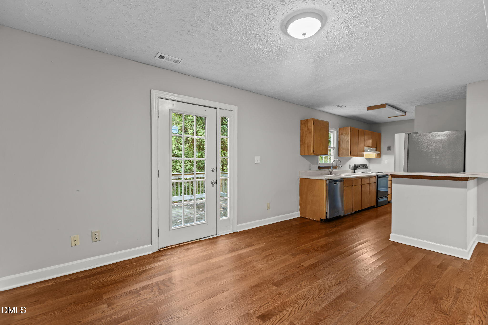 2501 Anne Carol Court Raleigh, NC 27603 - Photo 15 of 36 a view of kitchen with granite countertop cabinets and sink