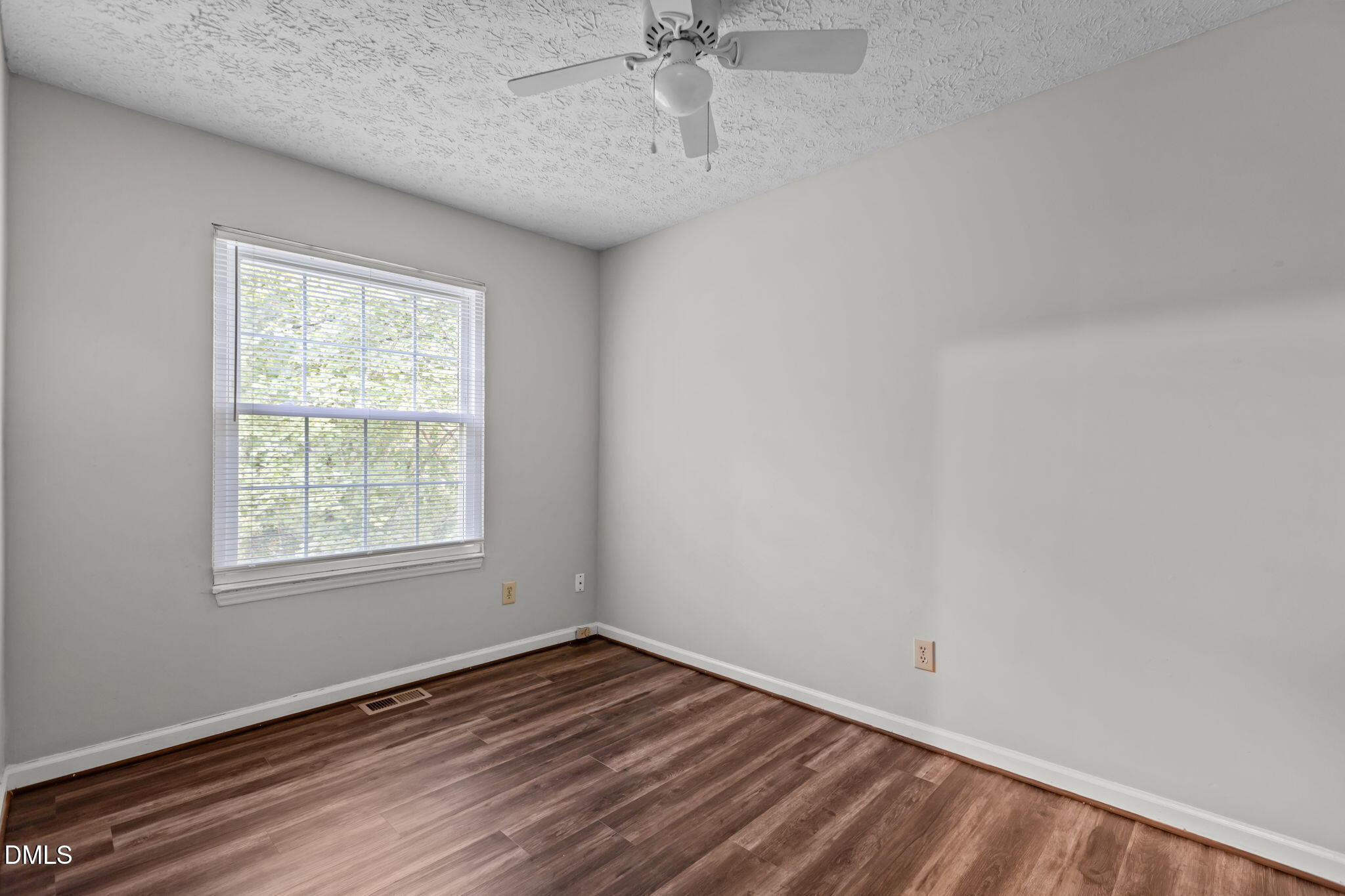 2501 Anne Carol Court Raleigh, NC 27603 - Photo 20 of 36 an empty room with a window
