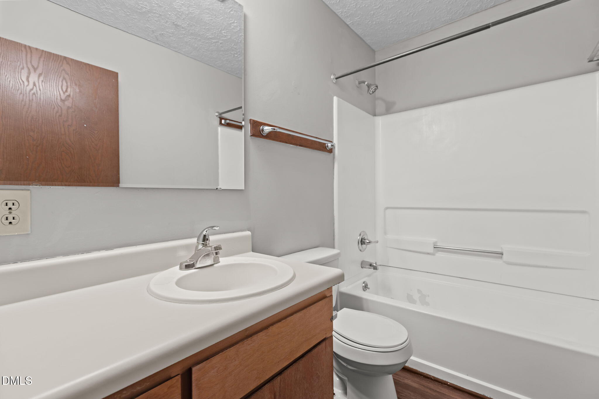 2501 Anne Carol Court Raleigh, NC 27603 - Photo 22 of 36 a bathroom with a sink and a toilet
