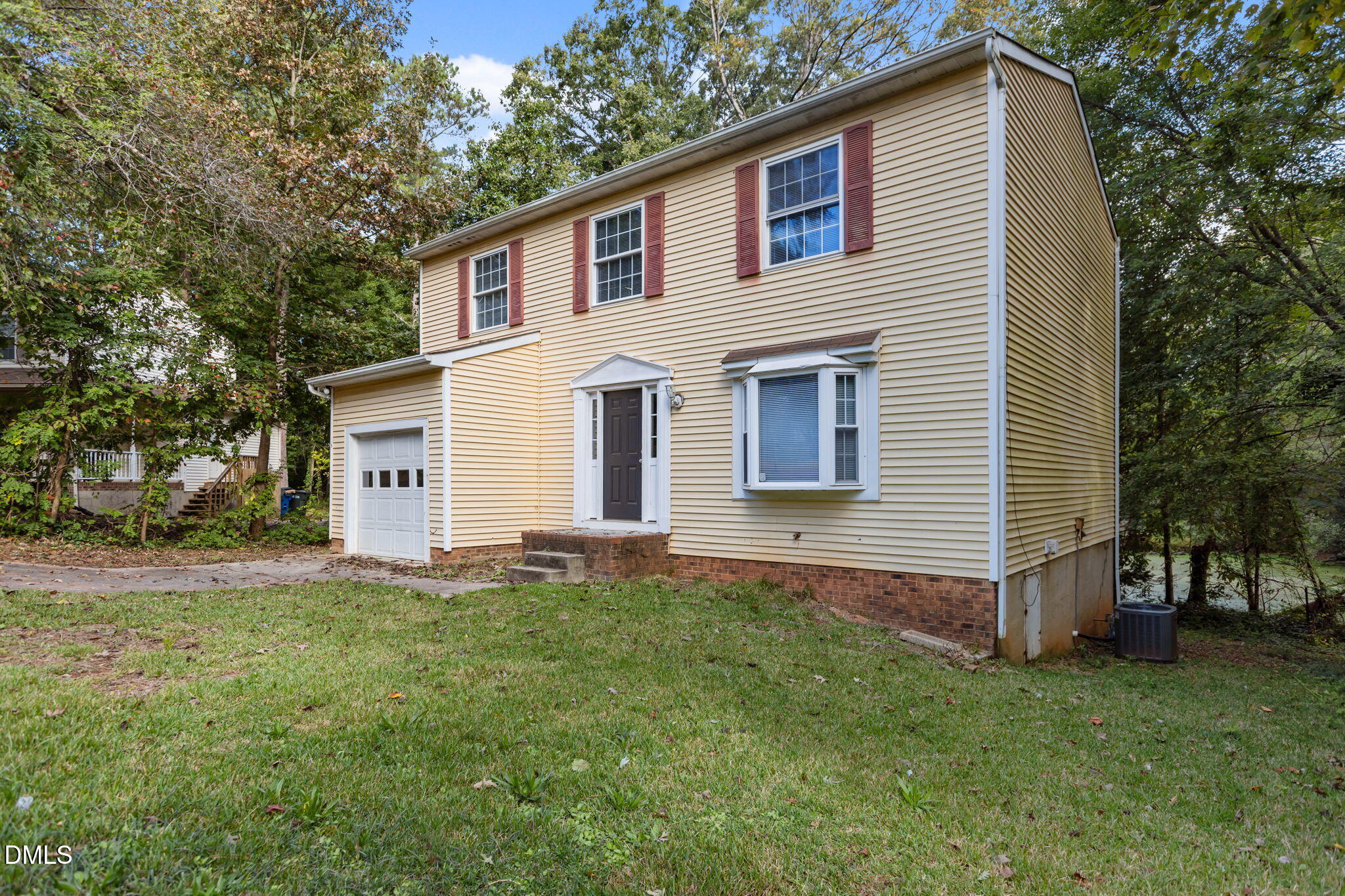 2501 Anne Carol Court Raleigh, NC 27603 - Photo 32 of 36 a view of a house with a yard