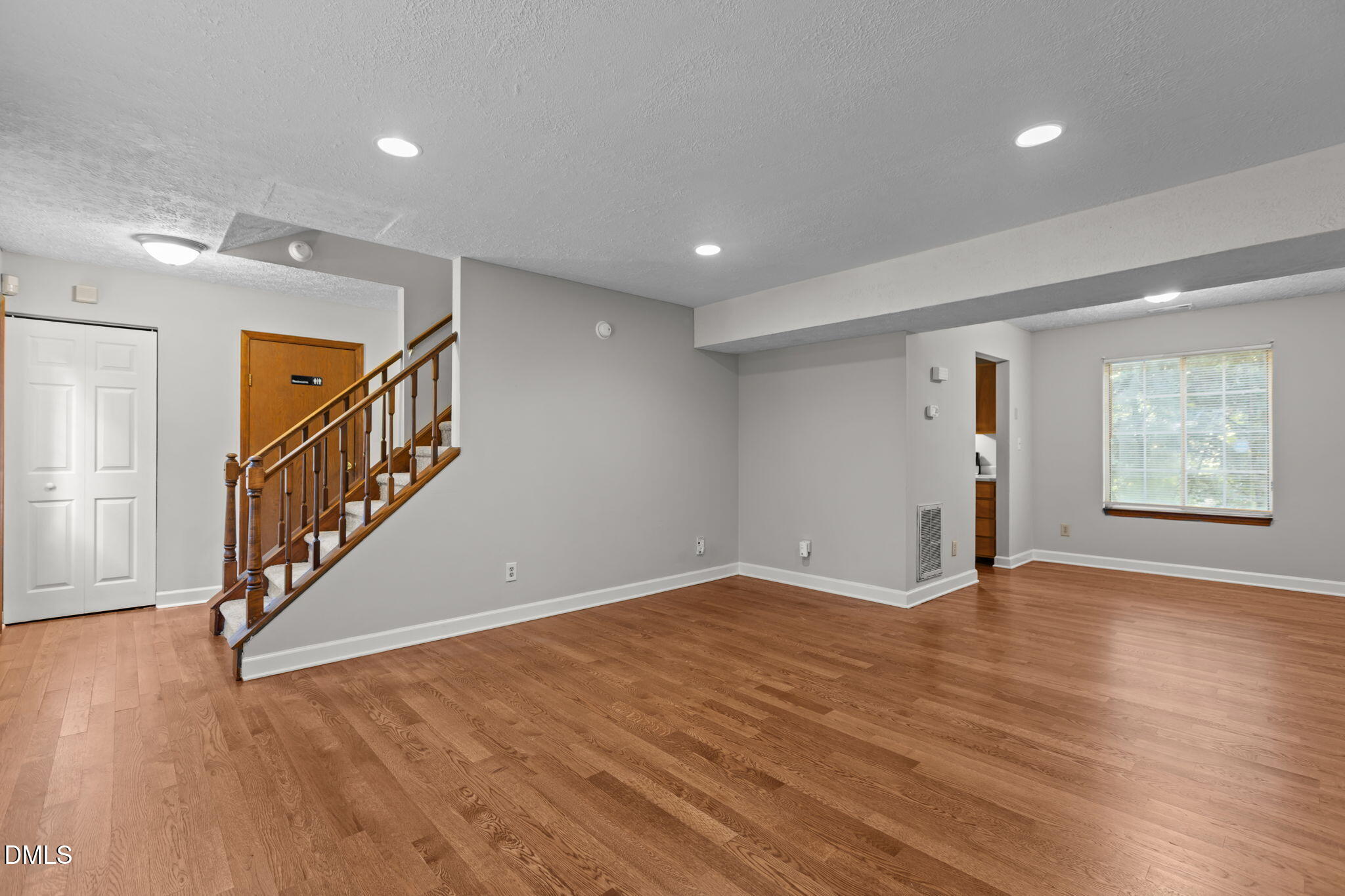 2501 Anne Carol Court Raleigh, NC 27603 - Photo 5 of 36 a view of an entryway with wooden floor