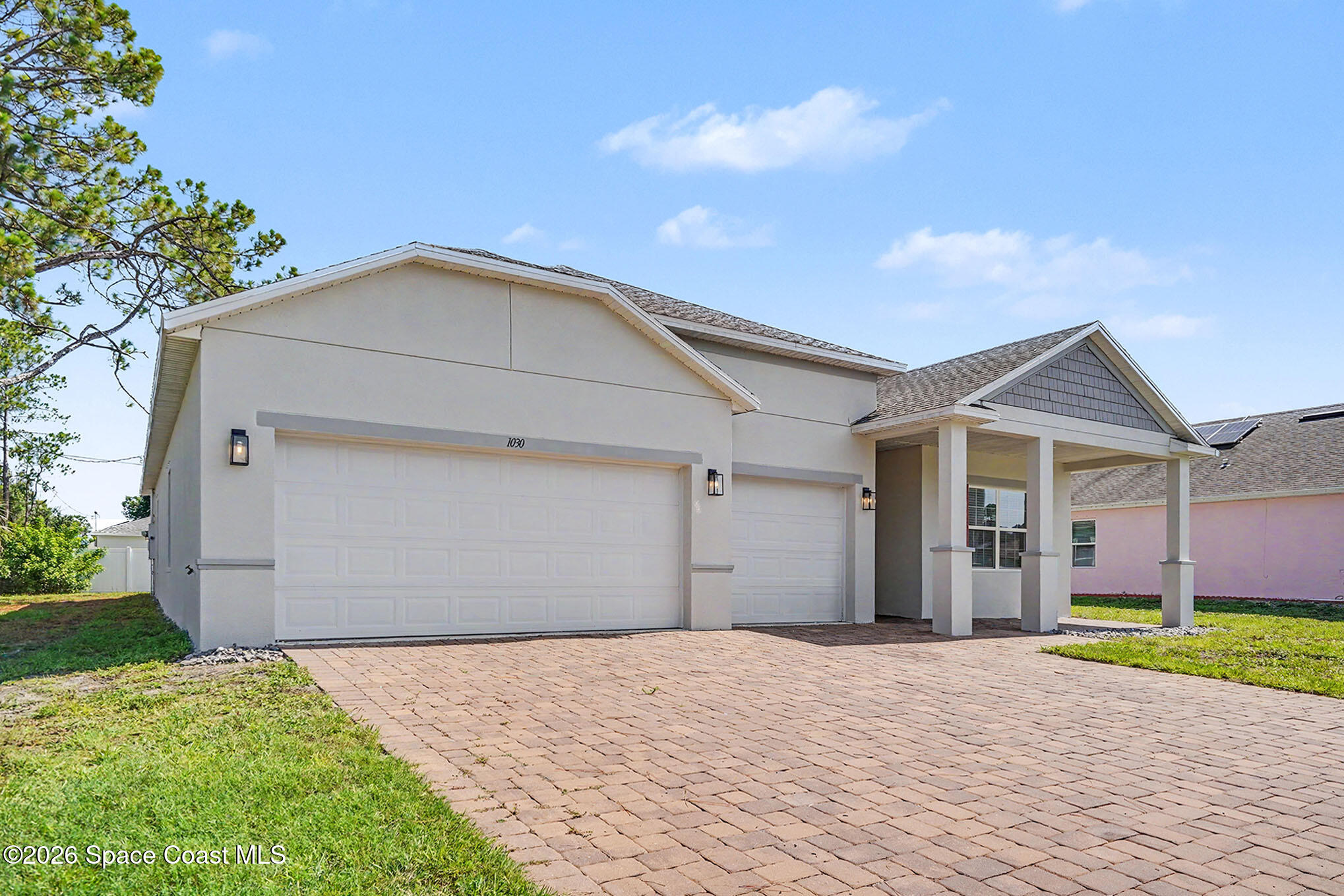 1030 Grapefruit Road Southeast Palm Bay, FL 32909 - Photo 22 of 28 3 car garage